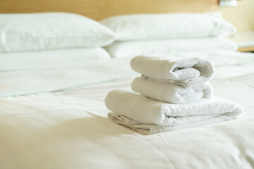 Obraz na płótnie Canvas close-up white towel on bed