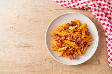 stir-fried penne pasta with kimchi and bacon