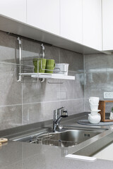 Close up of a kitchen area interior with a cabinet