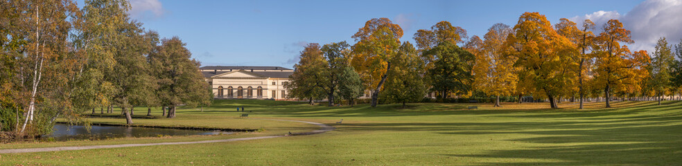 Park view on the island Drottningholm, a sunny colorful autumn day in Stockholm