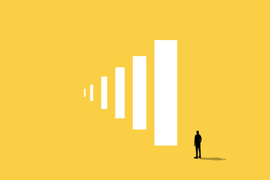 Businessman standing have big ambition. concept of success, opportunity, growth and motivation