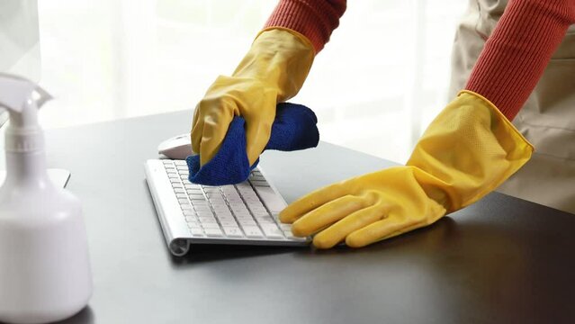 Startup Company office cleaning staff, organizational cleanliness, office equipment and computer cleaning staff. Cleaning concept for organizational hygiene and prevention of epidemic viruses.