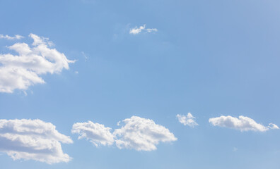 White bird clouds under the blue sky. sunny weather