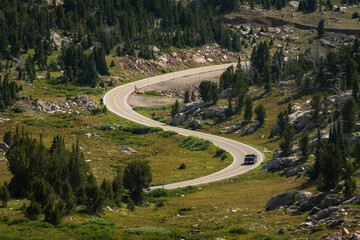 Winding mountain road with truck