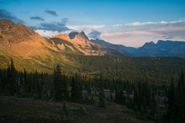 Sunlit peak and surrounding forested landscape in montana