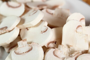 Fototapeta na wymiar Mushroom slices. Making Chicken, Cheese and Leek Parcel Series.