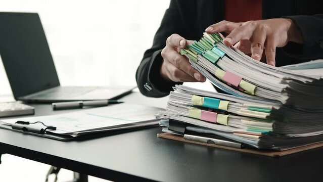 Businessmen deal with piles of documents, manage company financial documents, store important documents, design document management systems in organizations. Document management concepts, work files.
