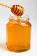 Jar of Honey with Honey Dipper