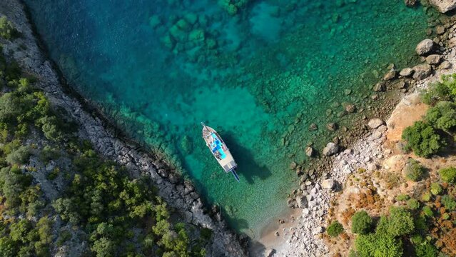 Amazing aerial view of mediterranean bay with boat. 