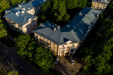 Fototapeta premium Aerial view of residential urban development in a residential area. Three-story house from the USSR period. Obninsk, Russia