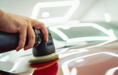Fototapeta premium Detailing of clean and shining polished red car