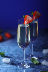 Two glasses of champagne with strawberry	