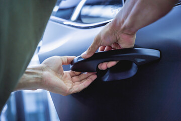 Replacing spare parts on a disassembled car in a car service garage