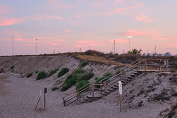 Twilight Dunes: Beach Pathway Under Cotton Candy Skies