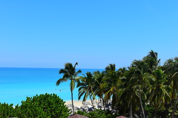 Fototapeta na wymiar Varadero ,CUBA - APRIL 08, 2023 : The beach of Varadero in Cuba on a beautiful summer morning