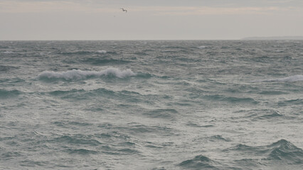 stormy mediterranean sea with cloudy weather and soft light