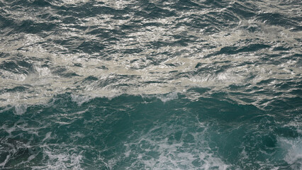 mediterranean sea waves of beautiful azure color closeup