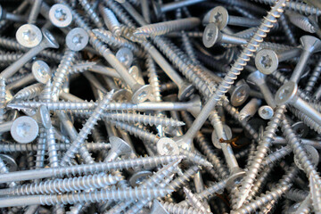 Screws for fastening structural parts,