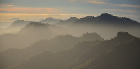 Backlit landscape of mountains seen from the summit  of Gran canaria at sunset, Canary Islands