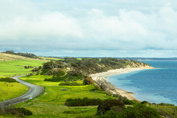 Australian green fields along the Great Ocean Road heading to Adelaide and to Kangaroo Island,...