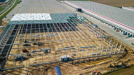 aerial drone view of construction of new warehouses
