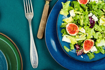 Salad with figs, herbs and cheese.