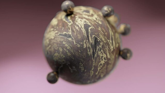 Small brown and creme colored balls orbiting a larger globe against a purple background