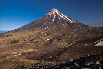 Verblyud Camel extrusion rock and the Koryaksky volcano on Kamchatka peninsula, Russia
