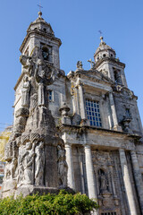 Fototapeta na wymiar Majestic Antique Catholic Church with Sky-High Crosses