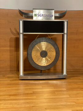 A large metal gong placed inside the Singapore Exchange    ( SGX ) centre .