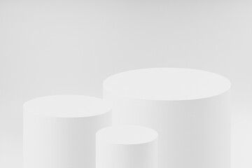 Abstract three white round cylinder podiums as mockup. Template for presentation cosmetic products, goods, advertising, design, sale, text, display, showing in modern style.