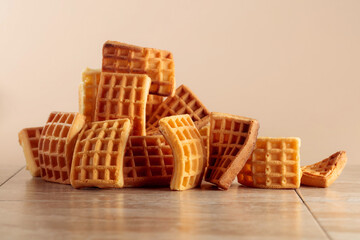 Belgian waffles on a beige background.