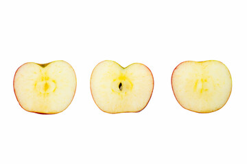 Red apple slices isolated on white background with clipping path and full depth of field. Top view. Flat lay.