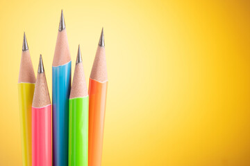 Set of sharp pencil on yellow background