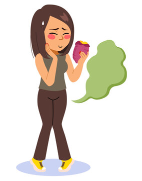 Woman farting after eating yummy sweet potato. Girl celebrating castanyada catalonia holiday event