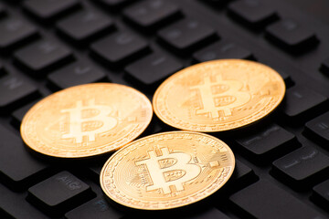 closeup of bitcoin at keyboard
