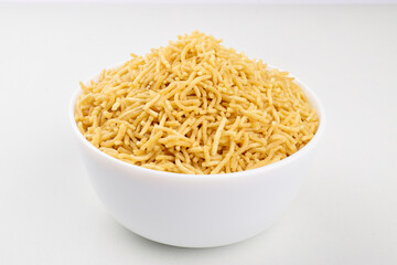 Bhujia namkeen in bowl on white background