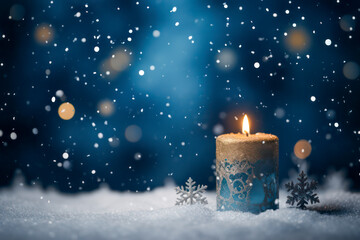 Christmas decoration with candle and snow