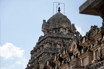 Ancient hindu temple tower. Airavatesvara Temple against blue sky background in Darasuram, Kumbakonam, Tamilnadu.