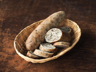 sliced black sesame seed bread in basket