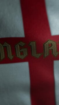 England Saint George flag texture background, vertical phone portrait orientation, waving banner in wind, red cross colour textile, stiching and lettering animation
