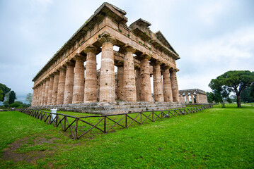Fototapeta na wymiar Temple of Poseidon in Archaeological Park of Paestum - Italy