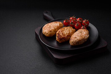 Delicious fresh chicken cutlets or meatballs with salt, spices and herbs