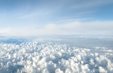 Fototapeta na wymiar Cumulus clouds in sky, top down view from air plane