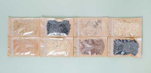 Set for growing sprouts from seeds. Sunflower, radish, wheat, pea seeds lay flat, top view