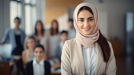 Portrait of a young female teacher in a classroom