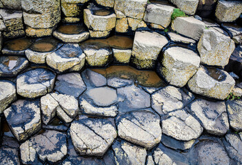Giant's Causeway, an area of about 40,000 interlocking basalt columns in Northern Ireland - 666061692