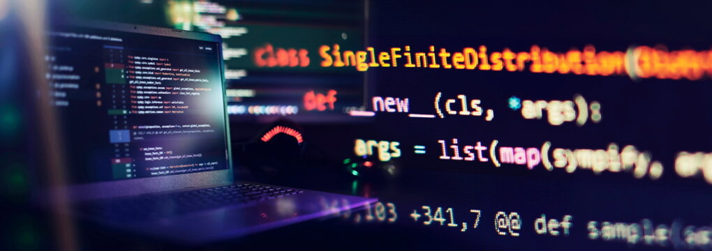 IT specialist workplace. Computer code data. Project managers work