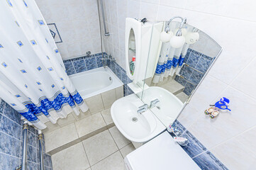 interior apartment room bathroom, sink, decorative elements, toilet