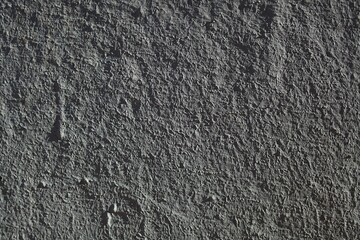 Neutral background with low contrast. Gray abstract stone texture background. Plaster texture for background
